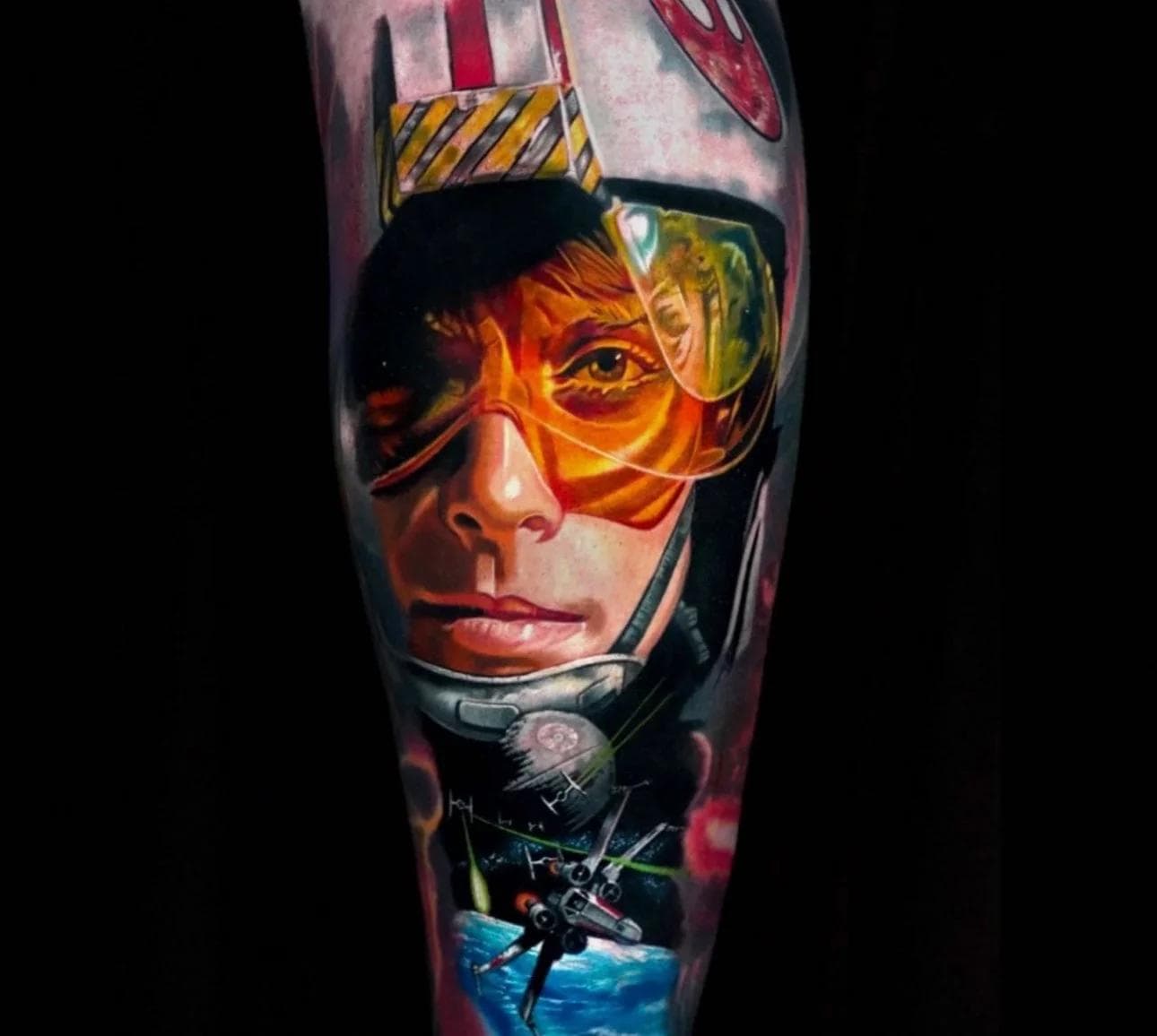 Colorful realistic pilot character tattoo on calf